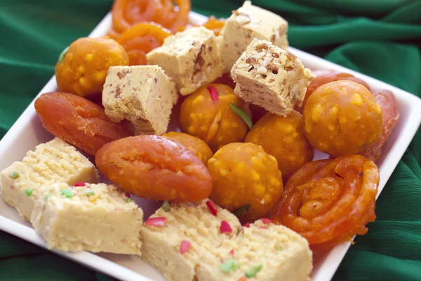 Colorful Indian Diwali  sweets in plain white dish — Stock Photo, Image