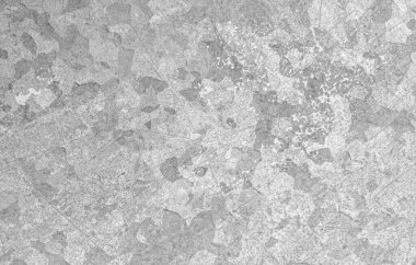 Grunge arkaplanı çizilmiş. Tahıllı duvar kağıtlarını üst üste koy. Eski tebeşir duvarı. Grunge Kirli metal dokusu. Antika paslı sıçratma. Soyut lekeler. Gri grunge yüzeyi.