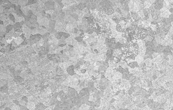 Grunge arkaplanı çizilmiş. Tahıllı duvar kağıtlarını üst üste koy. Eski tebeşir duvarı. Grunge Kirli metal dokusu. Antika paslı sıçratma. Soyut lekeler. Gri grunge yüzeyi.