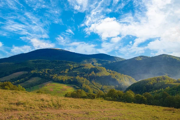 Hills Covered Green Trees Fields Mountains Sunrise Blue Sky Clouds — Stockfoto