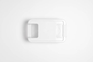 Kapağı beyaz arka planda izole edilmiş plastik yiyecek kabı. Depolama konteynırı. Yüksek çözünürlüklü fotoğraf. Üst görüntü. Model.