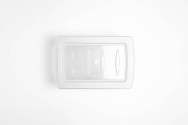 Kapağı beyaz arka planda izole edilmiş plastik yiyecek kabı. Depolama konteynırı. Yüksek çözünürlüklü fotoğraf. Üst görüntü. Model.
