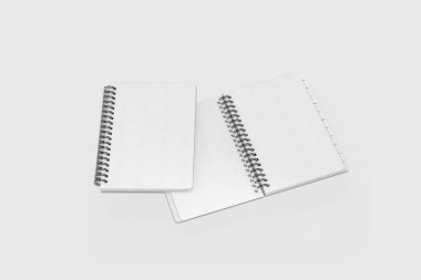 Defter maketi, boş kapaklı not defteri ve beyaz arka planda izole edilmiş tasarımın için ayır. 3 boyutlu görüntüleme. Model