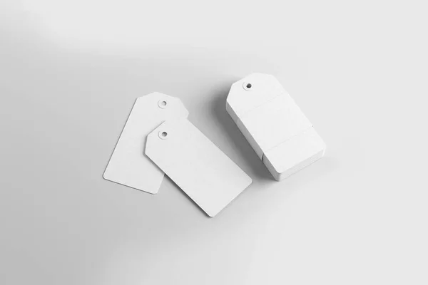 白い背景に隔離された空の紙ラベルまたは布タグセット 3Dレンダリング モックアップ — ストック写真