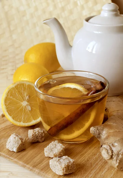 Cup of tea with a lemon and ginger — Stock Photo, Image