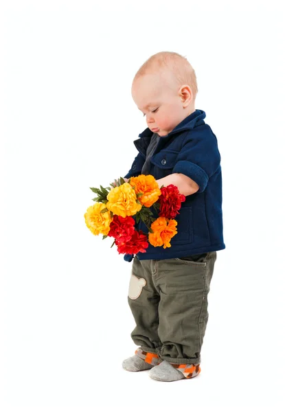 Chlapec s květy — Stock fotografie