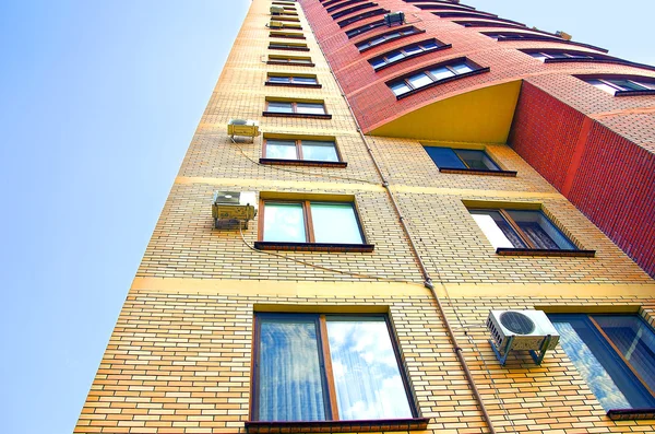 Facade of a new brick modern building — Stock Photo, Image