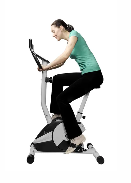 Training on bike exerciser — Stock Photo, Image