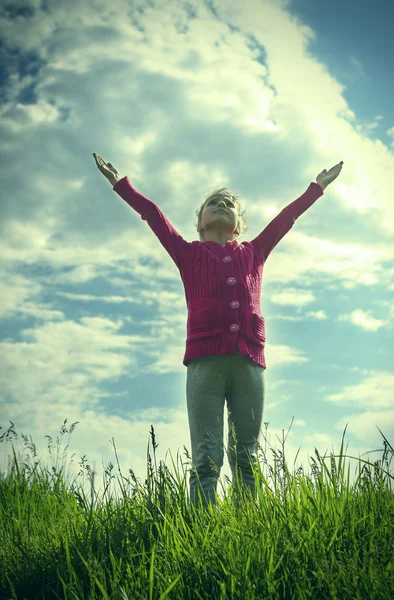 Girl pulls hands to the sky. — Stock Photo, Image