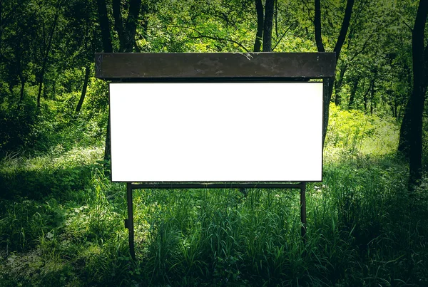 Billboard w lesie — Zdjęcie stockowe
