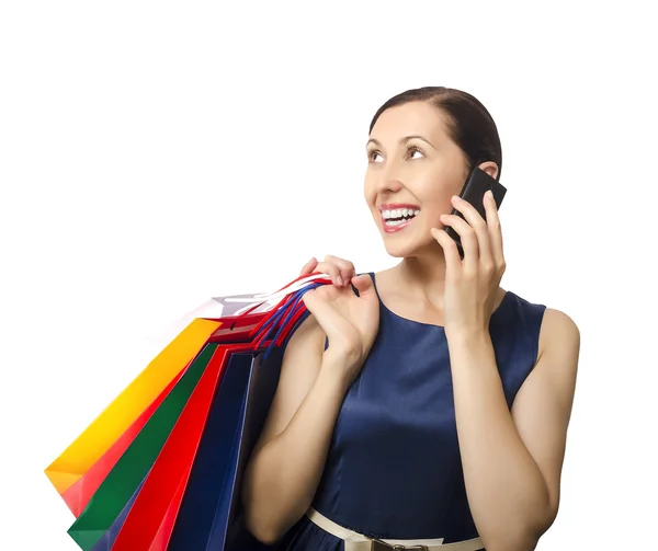 Mulher de compras falando ao telefone — Fotografia de Stock