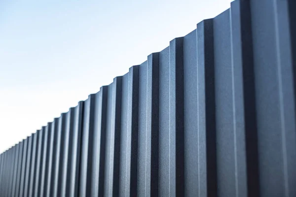 Iron Fence Blue Sky Fence Profiled Sheet Sky White Clouds — Stockfoto