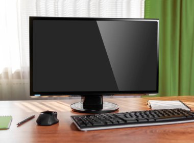 Personal computer on the table at home. Workplace.