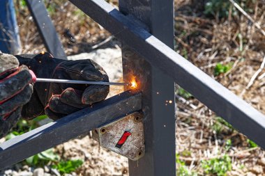 Metal welding. The work of a welder with metal structures.