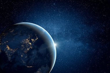 Yıldızlı gökyüzü ve Dünya gezegeni açık uzayda. Bu görüntünün elementleri NASA tarafından desteklenmektedir.