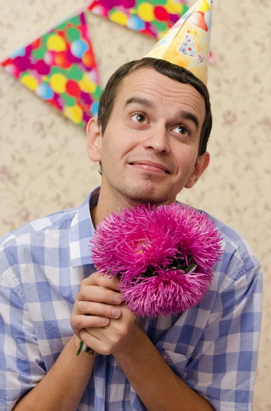 Happy man with flowers — Stock Photo, Image