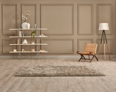 Kahverengi duvar arkaplanı beyaz kitaplık süsleme sepeti ve sallanan sandalye halısı ve lamba.