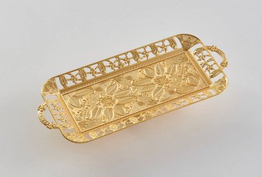 Gold and silver tray, zinc handmade white background isolated style.