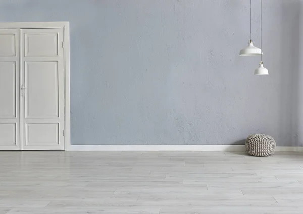 Grey Stone Wall Background White Wooden Door Lamp Carpet Home — Stok fotoğraf