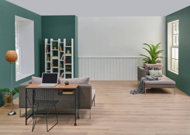 Dekoratif oturma odası, kanepe ve televizyon tarzı, yeşil ve beyaz duvar arka planı, kitaplık, dizüstü bilgisayarlı çalışma masası, bitki vazosu..