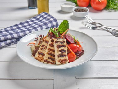 Green salad plate with cheese for menu and vegetables background style.