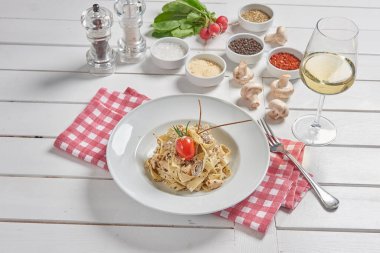 Pasta and macaroni in the plate for menu style with sauce background.