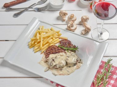 Mushroom tenderloin fried potato background for menu style.