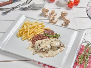 Mushroom tenderloin fried potato background for menu style.