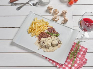 Mushroom tenderloin fried potato background for menu style.