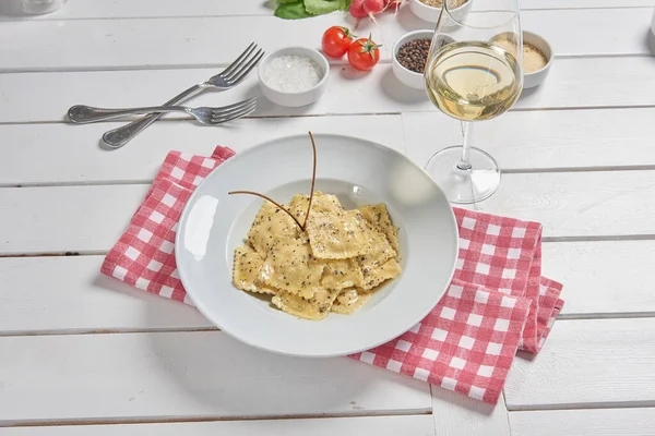 Pasta and macaroni in the plate for menu style with sauce background.