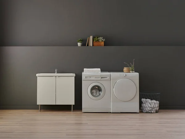 Bathroom, laundry, washing and dry machine, sink cabinet, mirror and object, grey wall background.