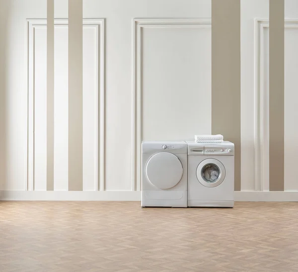 Washing and dryer machine in the room, white and brown vertical wall style background.