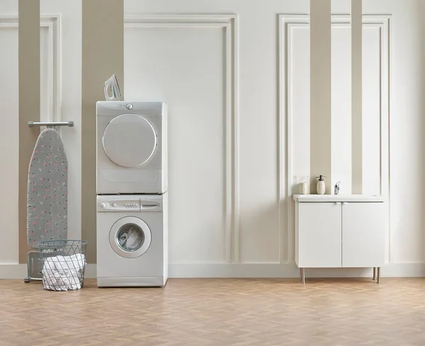 Washing dryer machine and ironing table interior style, laundry room, white and brown vertical wall background.