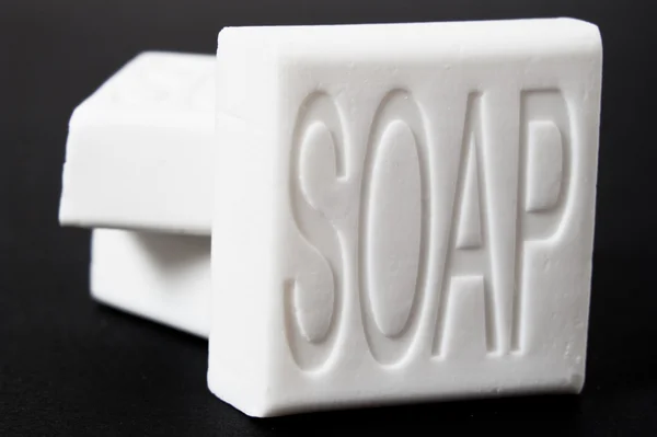 Soap bars on black background — Stock Photo, Image