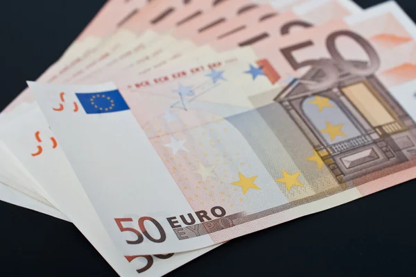 Eurobankbiljetten achtergrond van 50 euro Stockafbeelding