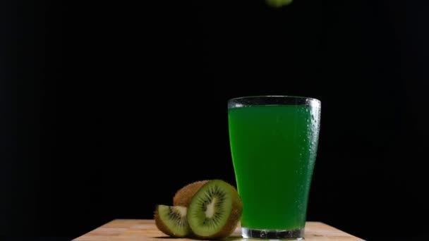 Kiwi Flies Glass Juice — Stock Video