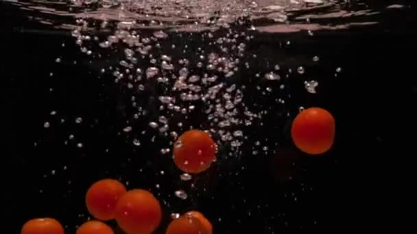Tomatoes Water Slow Motion — Stock Video