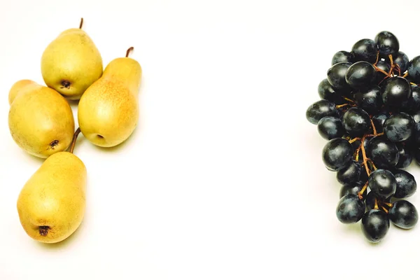 Vitamins, yellow ripe pears and black sweet wine — Stock Photo, Image