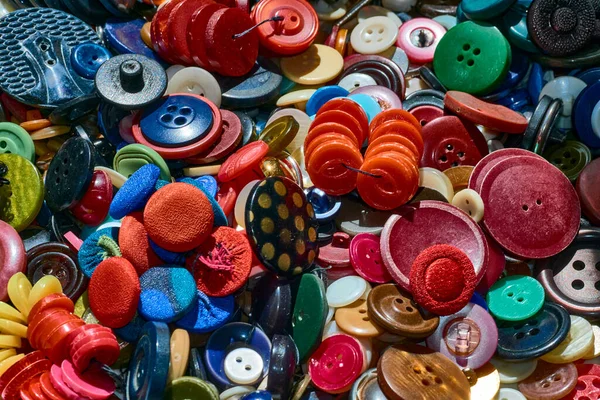 Parlak renkli çerçeve terzisi birçok çok renkli düğme arkaplanı