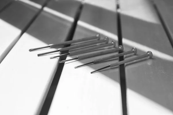 Repair set of metal screwdrivers on a black and white background — 스톡 사진