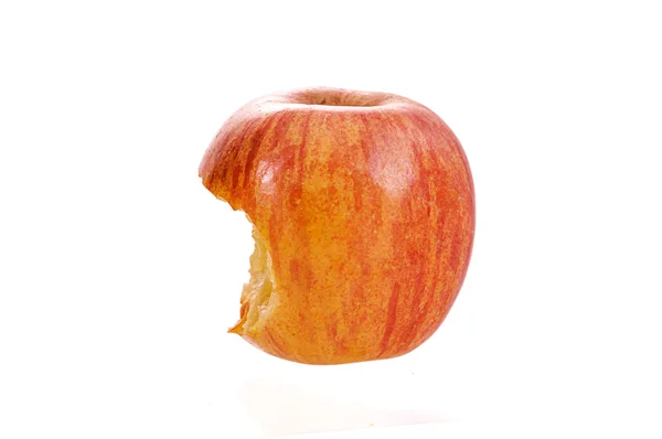 Яблоко укусил изолированный — стоковое фото