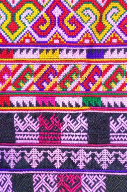 Tayland 'ın kuzeyinde geleneksel dokuma kumaş desenleri. Eski kumaş renginde Tayland el işi..