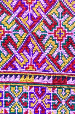 Tayland 'ın kuzeyinde geleneksel dokuma kumaş desenleri. Eski kumaş renginde Tayland el işi..