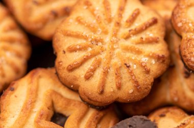 Çikolata kremalı kıvırcık kurabiyeler, arka plan resmi, yakın plan, seçici odak