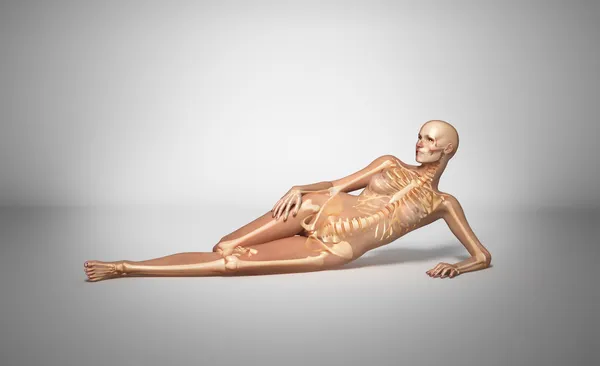 Laying woman with bone skeleton. — Stock Photo, Image