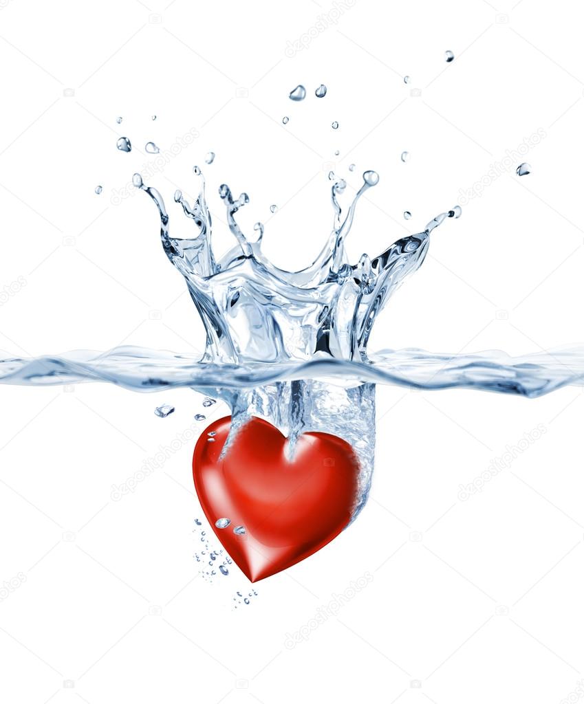 Shining heart, splashing into clear water. — Stock Photo © Pixelchaos