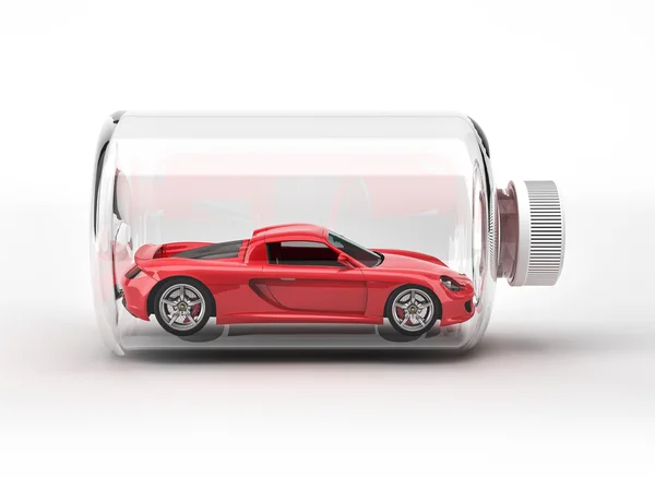 Carro esporte vermelho fechado dentro de uma garrafa . — Fotografia de Stock