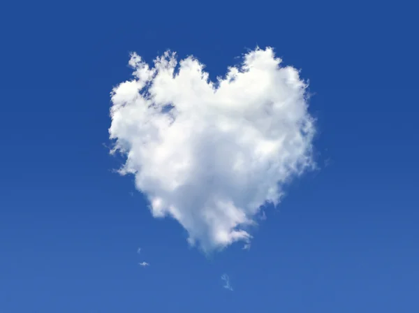 Fluffy cloud of the shape of heart, on a deep blue sky. — Stock Photo, Image