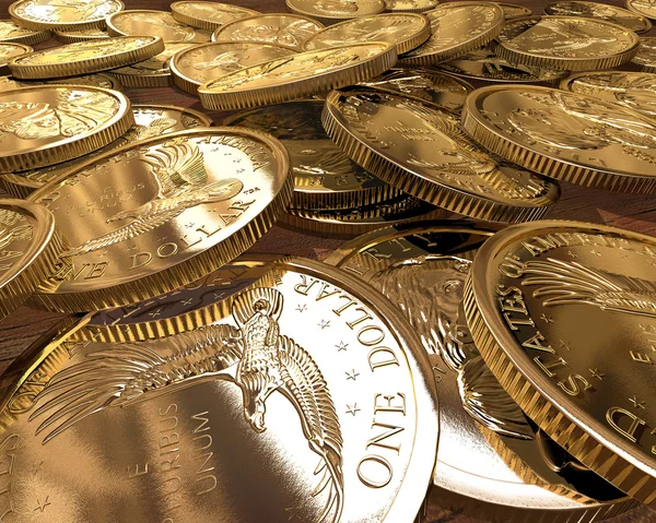 Group of gold dollars coins spread on a table — Stock Photo, Image