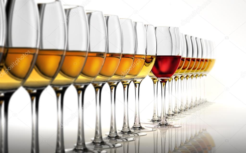 Row of many white wine glasses, with a red one standing out in t